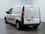 a picture of a white van parked in a room