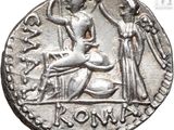 a silver coin with an image of a woman and a man on it