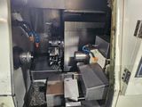 a machine that is sitting inside of a machine shop