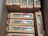 boxes of tools are stacked on top of each other in a cardboard box
