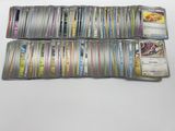 a bunch of cards sitting on top of each other on a table