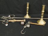 a lot of brass items that are on a black background
