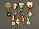 many medals and medals on display on a table