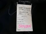 a label on the back of a chanel jacket