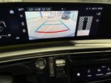 a picture of a car ' s dashboard with a camera on it