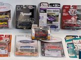 many different types of diecast cars on the table