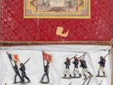 toy soldiers in a red box with flags and flags on them