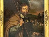 tableau représentant un saint tenant un bâton, dans un cadre doré