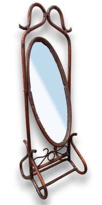 a mirror that is on a stand with a mirror on it