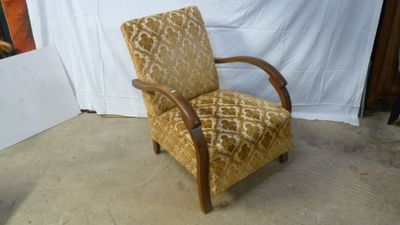 a chair that is sitting in the corner of a room