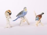 trois figurines d'oiseaux empilées les unes sur les autres