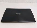 an image of a laptop computer sitting on top of a white surface