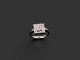 une image d'une bague en diamant sur une surface noire