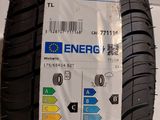 a close up of a tire with a sticker on it