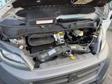 a car that has its hood open with the hood open