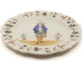 a plate with a picture of a man on it