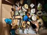 a cardboard box full of many different types of items