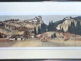 tableau représentant un paysage de montagne, dans un cadre