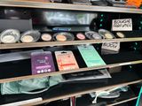 a display of makeup products in a store