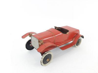 PINARD (Attribué à). Torpedo en tôle laquée rouge.