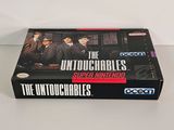 a box of the untouchables game on the table