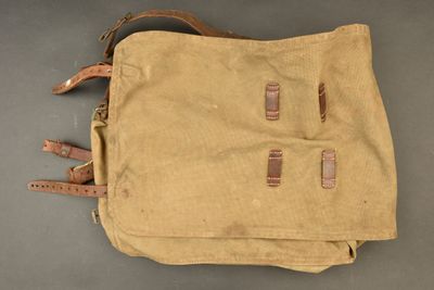 a close up of a brown bag on a gray surface
