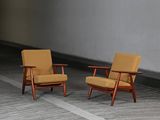two chairs that are sitting on a wooden floor