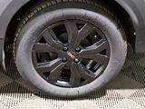a close up of a tire on a car ' s rim