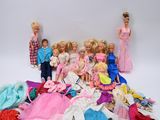 a lot of barbies and other dolls on a white background