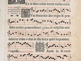 an old book with a page of music written on it
