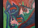 tableau représentant le visage d'une femme aux cheveux roux et aux yeux bleus