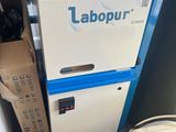 a white refrigerator with a blue door and a blue handle