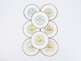 a picture of a bunch of plates with flowers on them