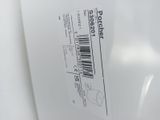 a close up of a white toilet with a barcode on it