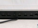 an image of a close up of a black device with a power cord