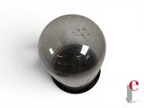 a glass ball that is sitting on top of a table
