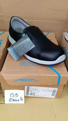 a pair of shoes that are on top of a box