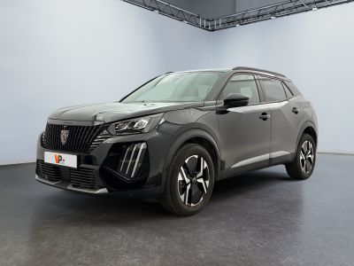 a grey suv is parked in a large room