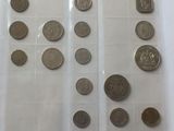 a lot of coins in a plastic bag on a table