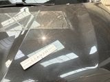 a sticker that is on the hood of a car