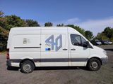 a white van that is parked in a parking lot