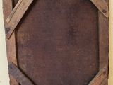a picture of an old wooden picture frame on the wall