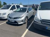 three cars parked in a parking lot next to each other