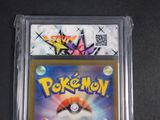 a close up of a pokemon card in a plastic case