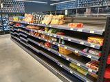 a lot of food on the shelves in the store