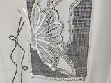 beaded t - shirt with a butterfly on the front