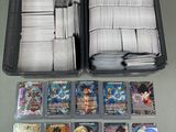 a lot of cards in the case on the table