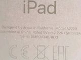 a picture of an apple ipad in a display case