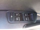 a close up of a car ' s interior with buttons