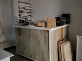 a kitchen with a refrigerator and a refrigerator freezer in it